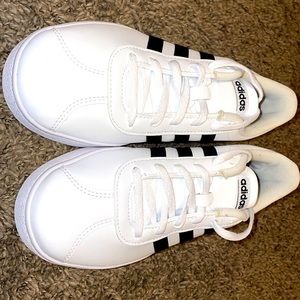 Adidas (Kids size 5), white with black stripe.